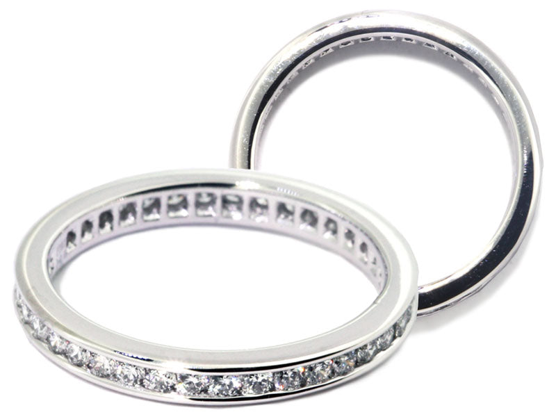 Platinum channel set engraved eternity band
