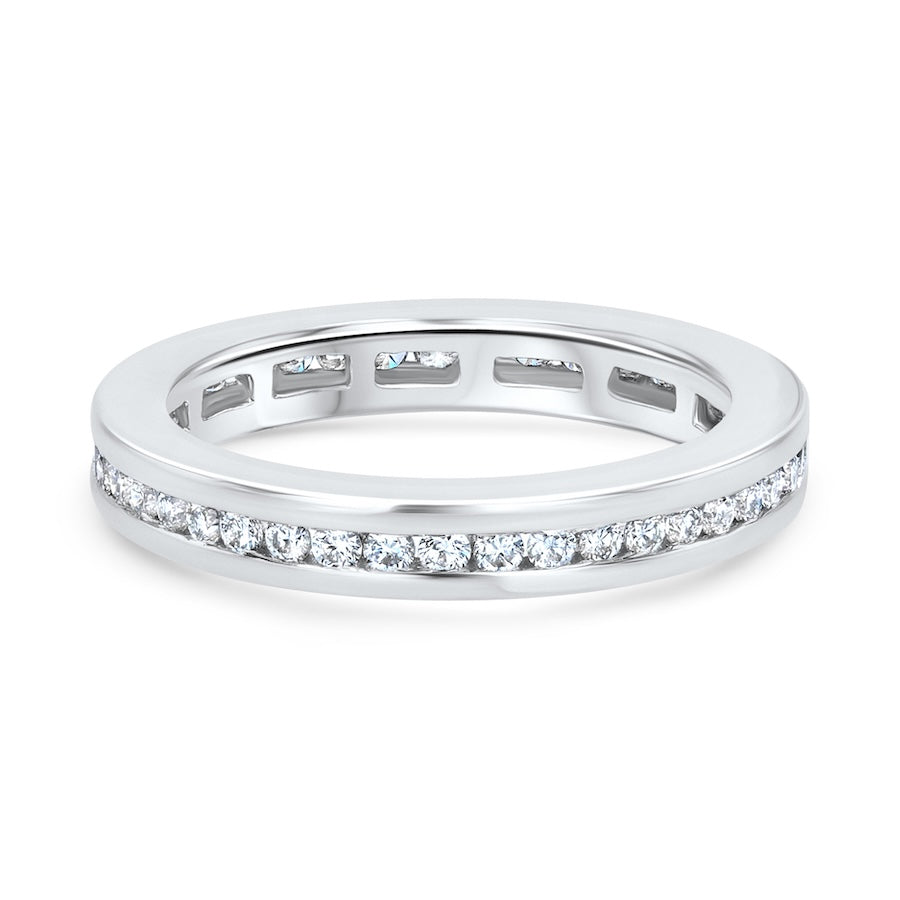 Platinum channel set engraved eternity band
