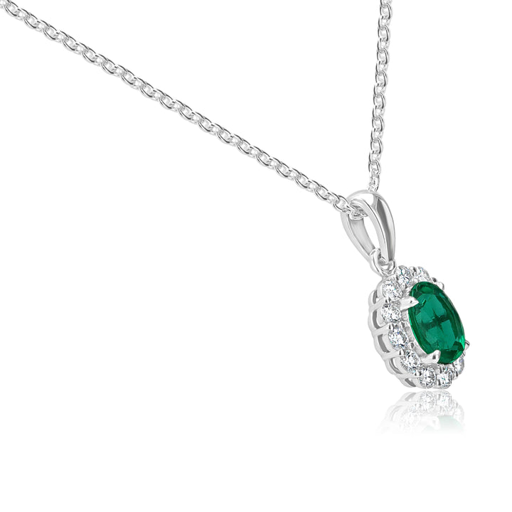Oval Emerald & Diamond Halo Pendant in 14K White Gold