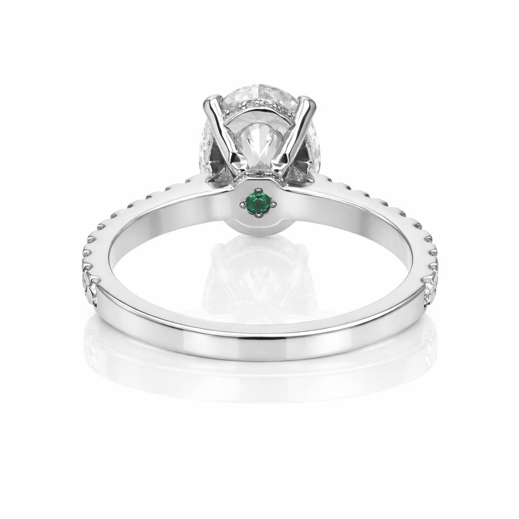 Oval Diamond Platinum Engagement Ring with Hidden Halo & Emerald