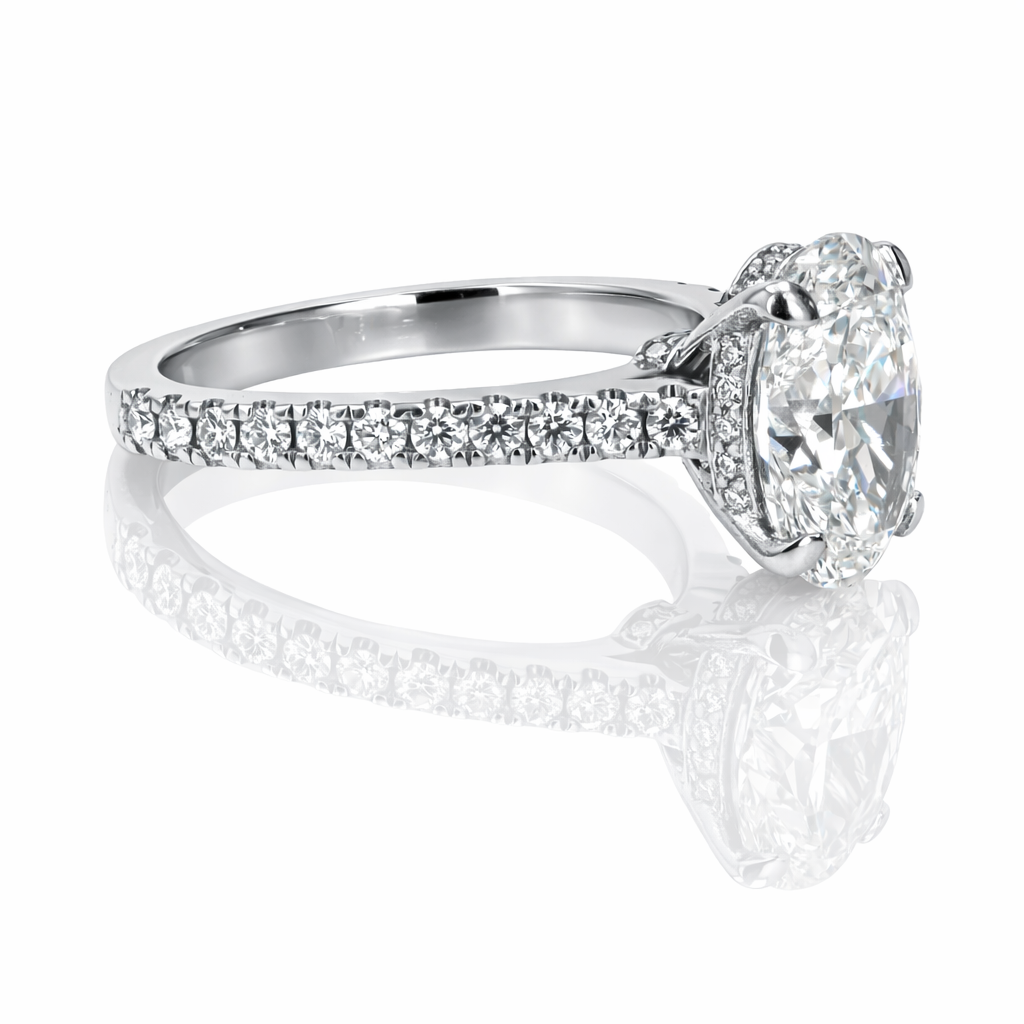 Oval Diamond Platinum Engagement Ring with Hidden Halo & Emerald