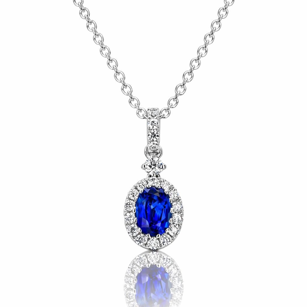 .70ct Oval Sapphire & .24ct Diamond Pendant in 18K White Gold