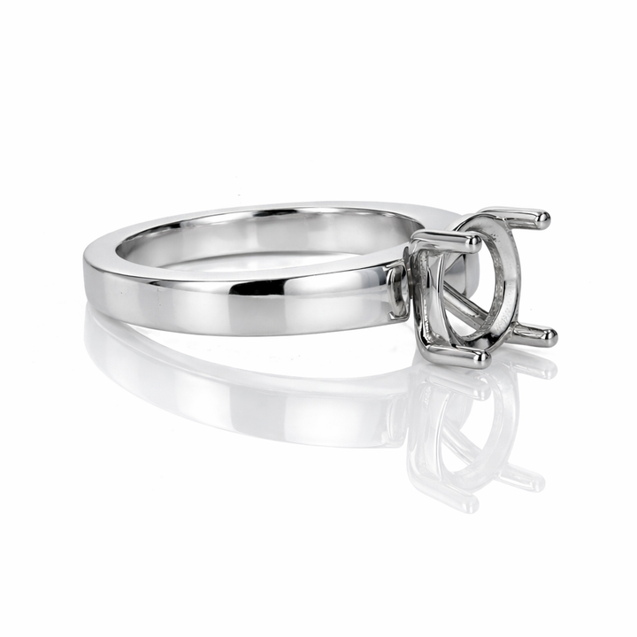 Platinum Solitaire Ring with Four-Prong Basket