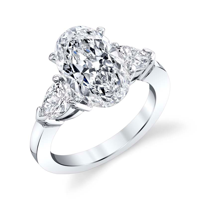 Classic three stone pear shaped platinum diamond mounting