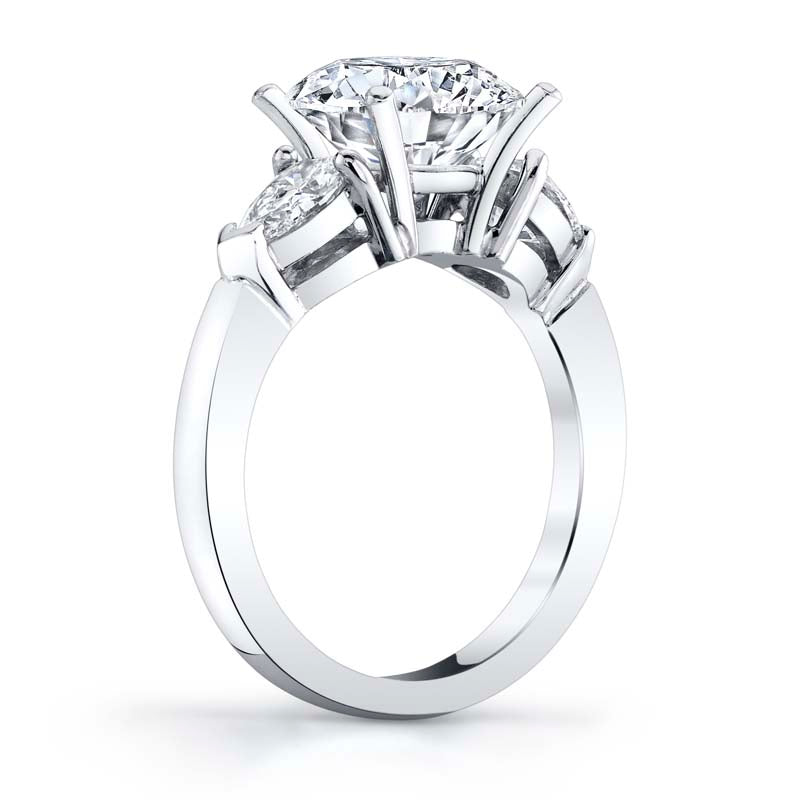Classic three stone pear shaped platinum diamond mounting