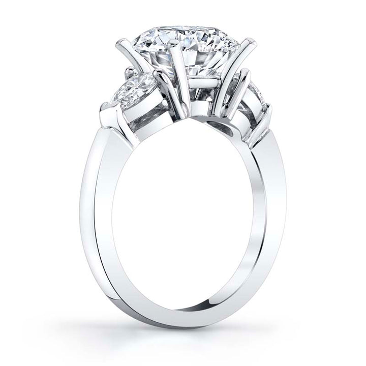 Classic three stone pear shaped platinum diamond mounting