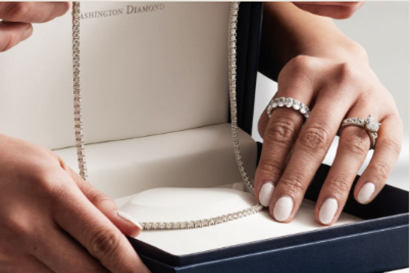 A finished piece presented in Washington Diamond packaging at the end of an appointment