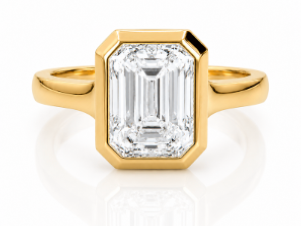 Emerald-cut bezel-set yellow gold engagement ring