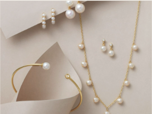 Pearl necklace, bracelet, and earrings from the fine jewelry collection