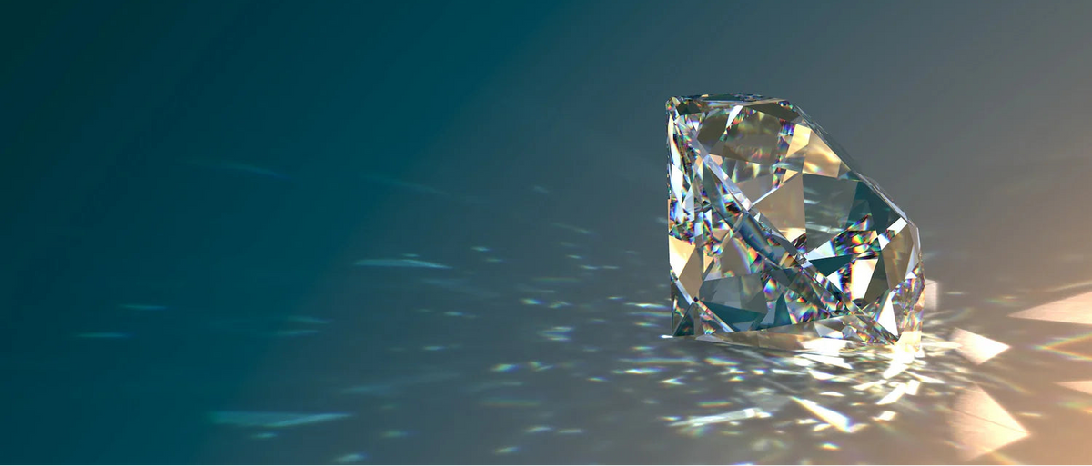 A brilliant-cut diamond on a deep blue background
